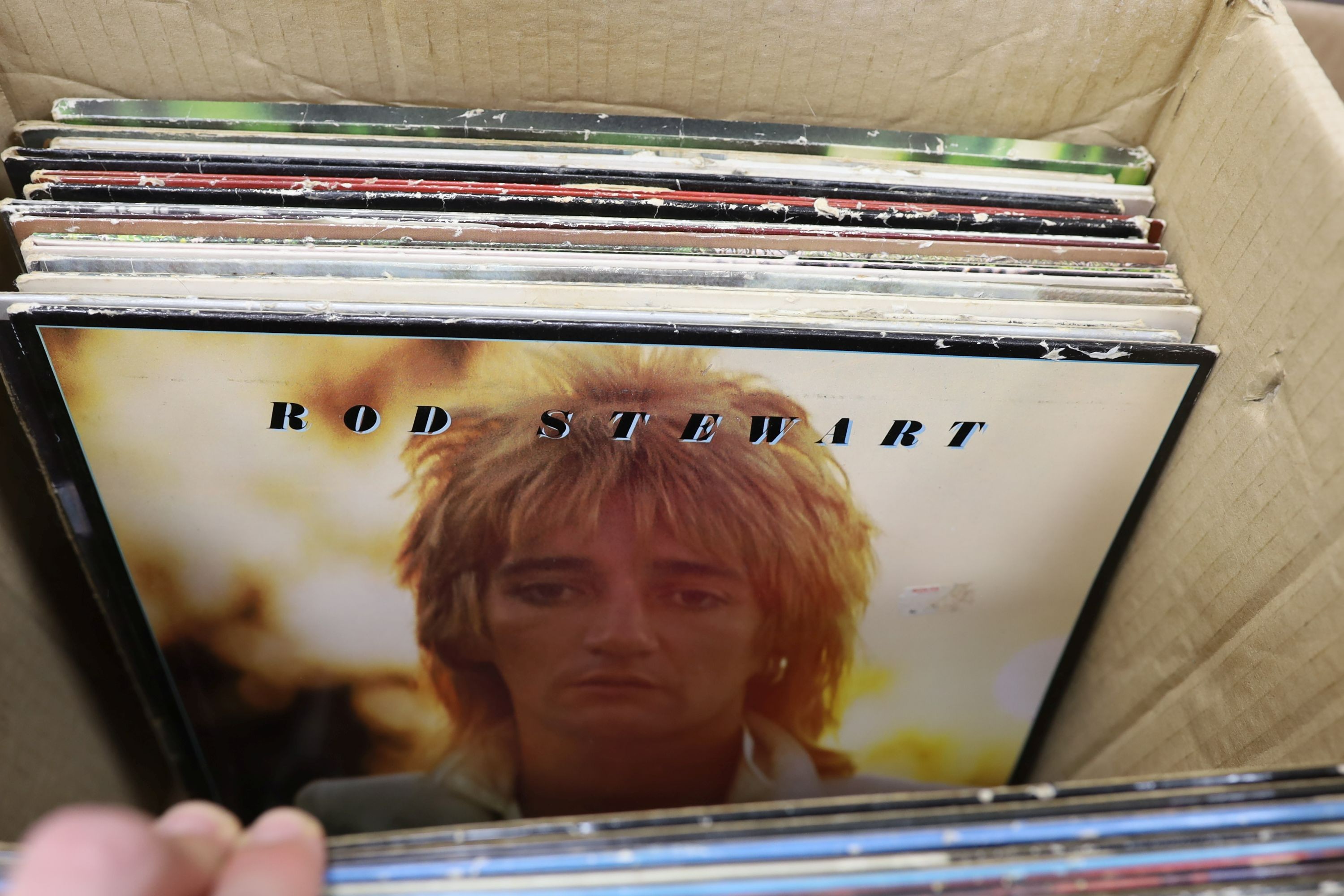 A collection of approximately 87 vinyl LPs to include The Beatles, David Bowie, Traffic, 10CC, Carly Simon etc